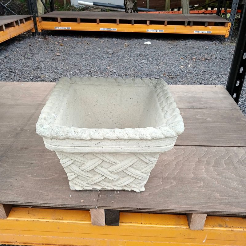 Square planter with a woven basket pattern and rope-twist rim